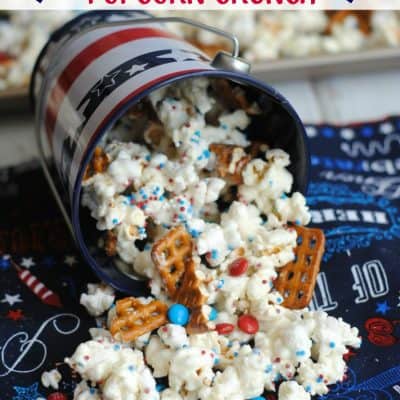 Amazing Patriotic Popcorn Crunch Recipe to try right now! Easy to make sweet and salty red, white & blue recipe- pairing the salty with the sweet!