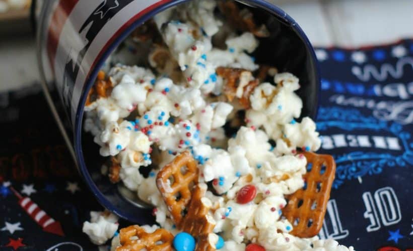 Amazing Patriotic Popcorn Crunch Recipe to try right now! Easy to make sweet and salty red, white & blue recipe- pairing the salty with the sweet!