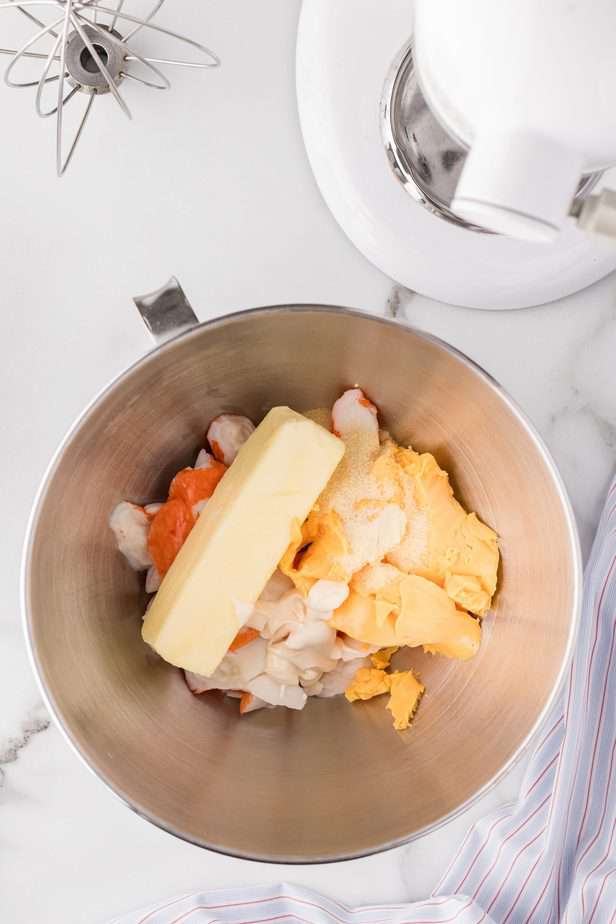 crab appetizers with crab meat, cheese and english muffins ingredients in mixing bowl 