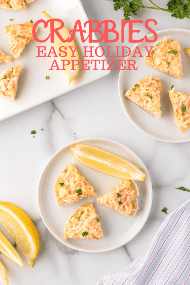 crab, cheese and english muffin appetizers on marble counter 