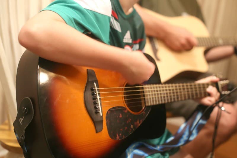 learning guitar with your child at home horiz