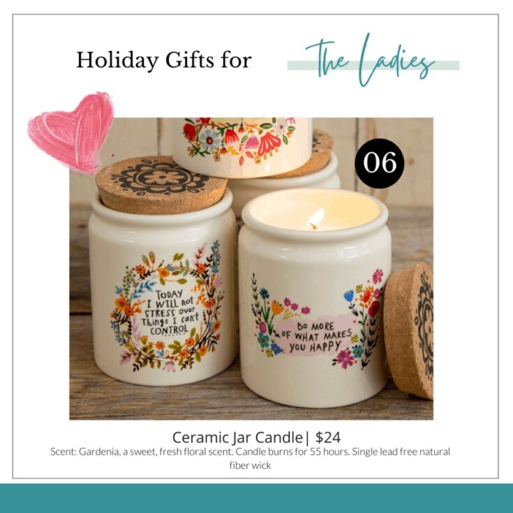 3 white ceramic jar candles with positive messages on the front