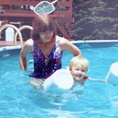 70s mom and toddler in pool moms get in the picture