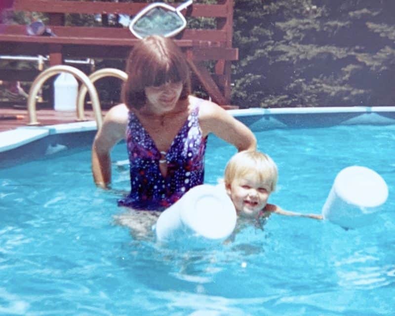 70s mom and toddler in pool moms get in the picture