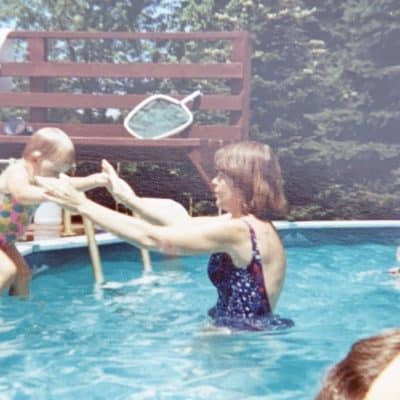 moms get in the picture 1970s mom catching toddler in pool