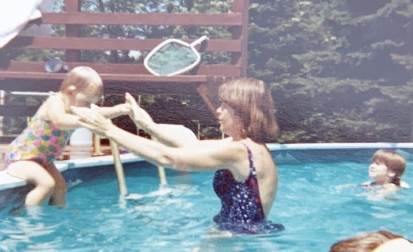 moms get in the picture 1970s mom catching toddler in pool