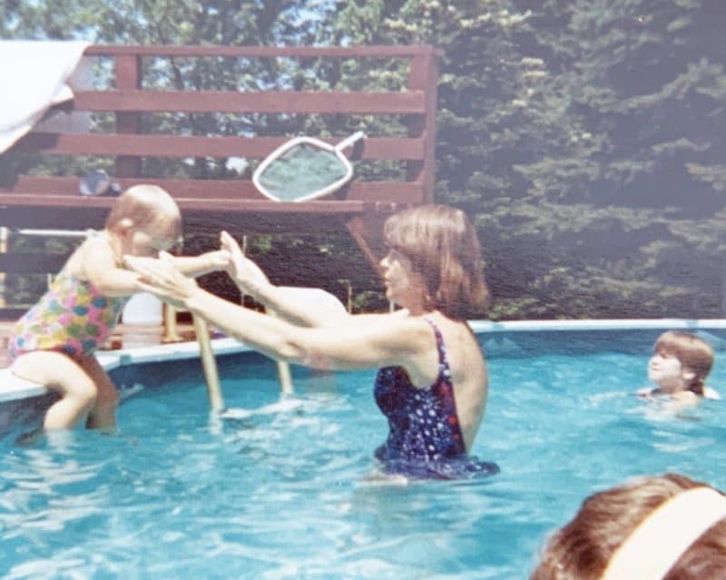 moms get in the picture 1970s mom catching toddler in pool