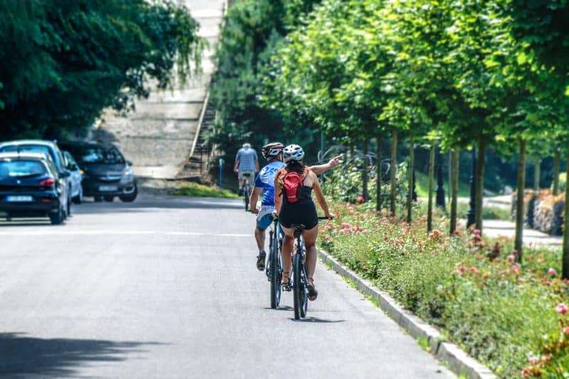 Man and Woman Riding Bicycle family exercise