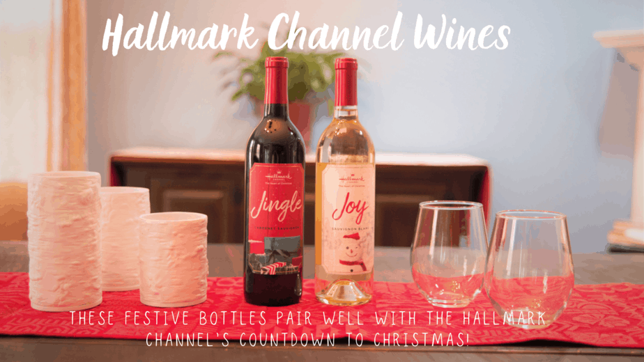 hallmark channel bottles of wine on red table runner with wine glasses and white candle holders