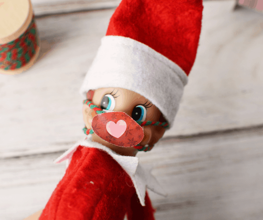 elf on the shelf with printable elf sized mask on face 