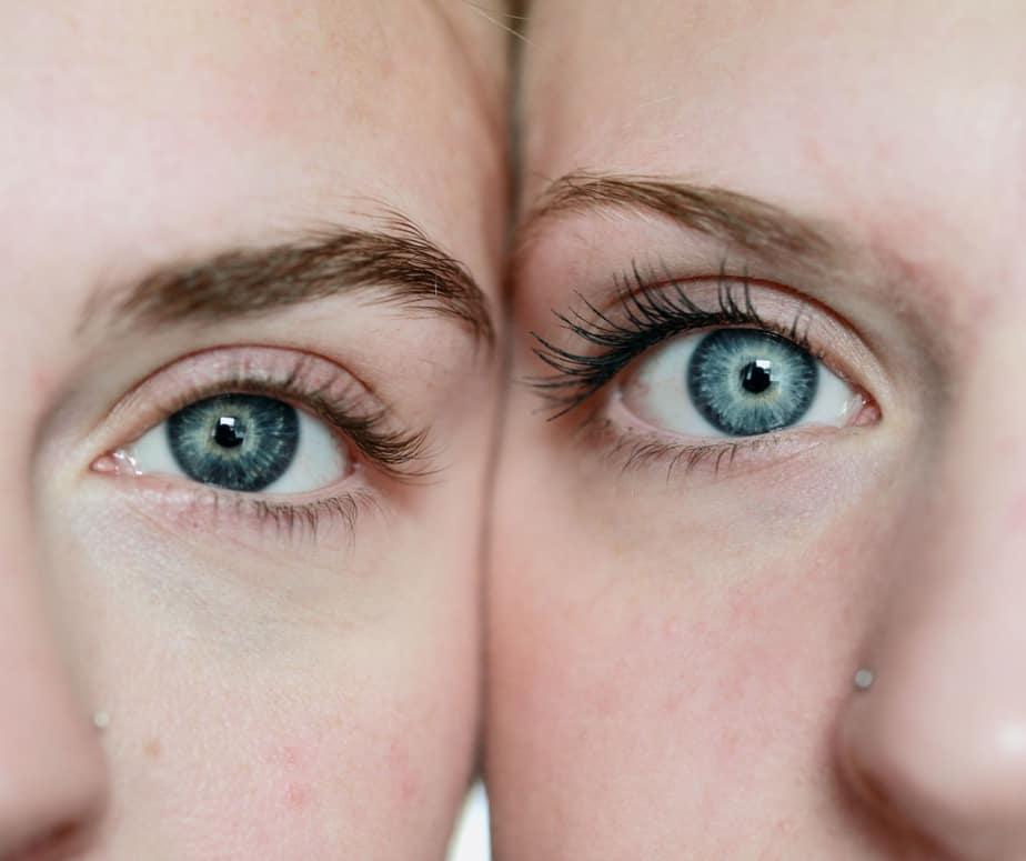 close up of two faces with two different eye colors