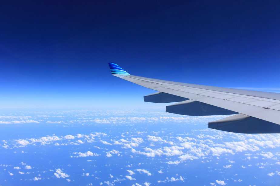 plane wing out of window in flight