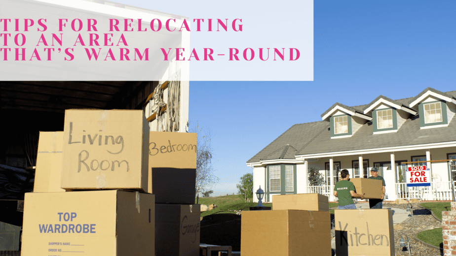 moving truck and boxes in front of a house on a sunny day