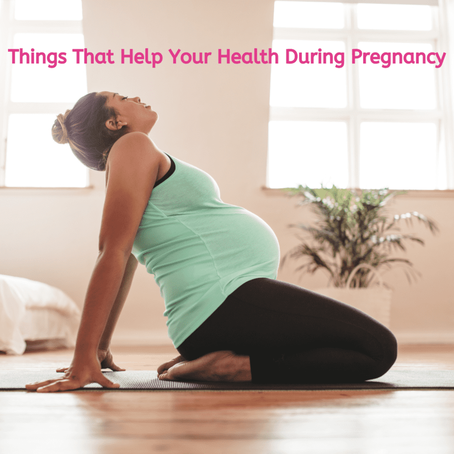 pregnant black woman leaning back doing yoga pose