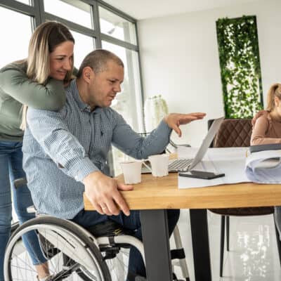 A physically challenged father works from home, supported by his family, who find moments of joy and connection amidst their daily routine.